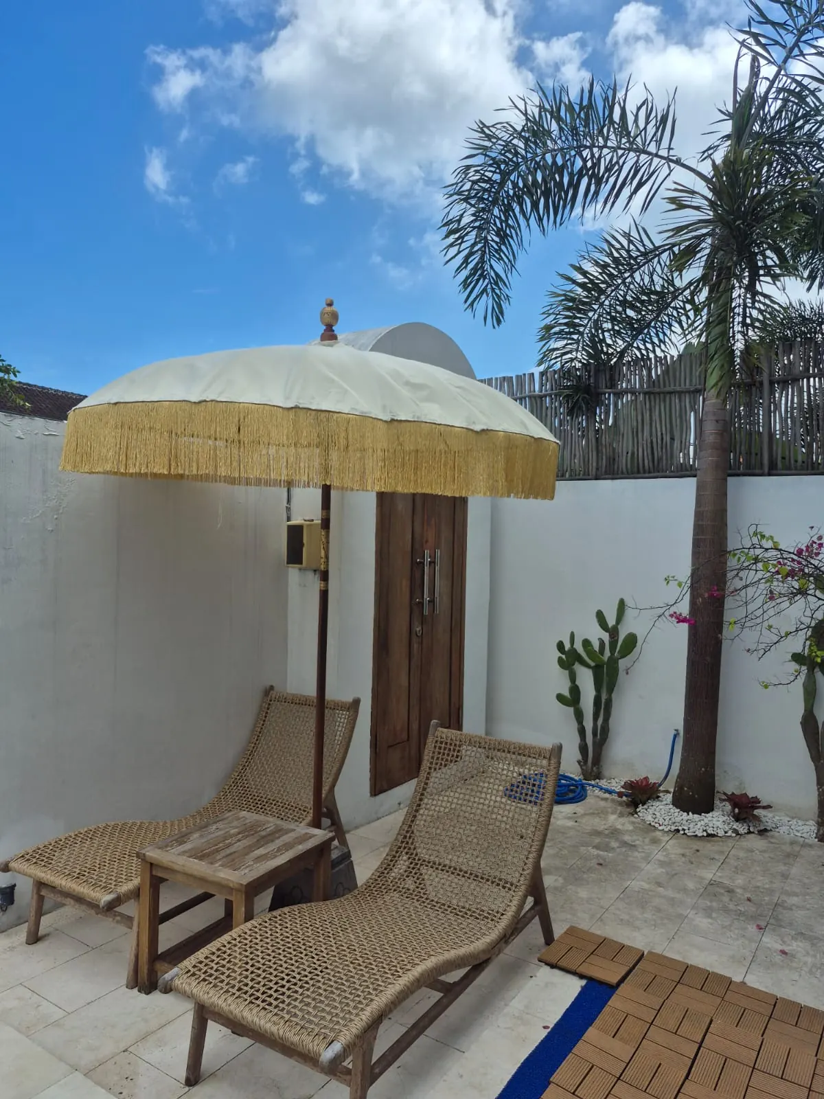 Sun loungers by the private pool – brand-new 1BR villa in Canggu