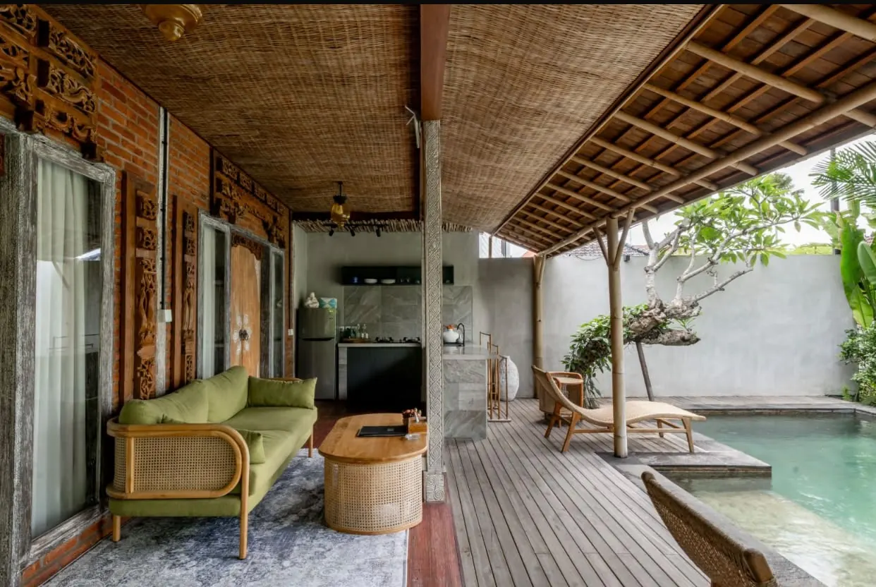 Covered terrace lounge beside the pool