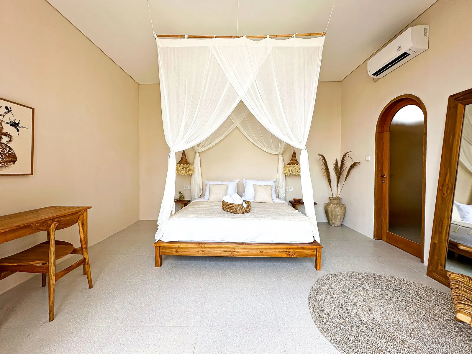 Bedroom with canopy bed and desk