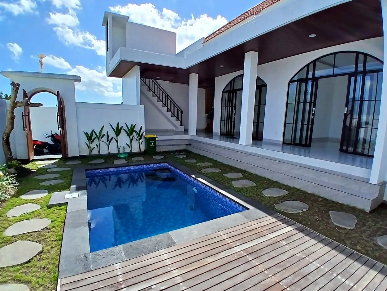 Private plunge pool, timber deck and terrace with arched black steel doors – unfurnished 2 bedroom villa for yearly rent in Padonan, Canggu