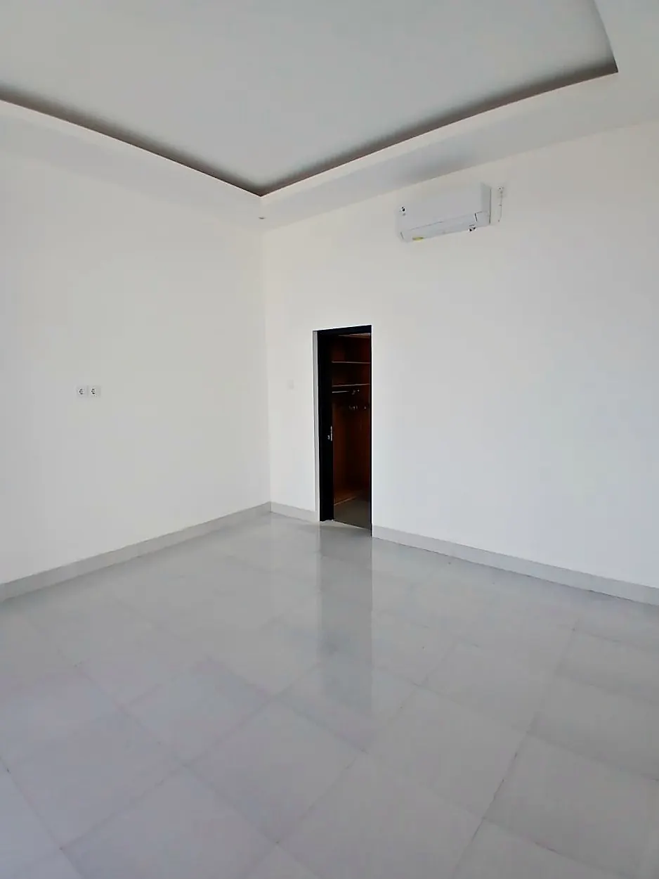 Unfurnished bedroom with air conditioning