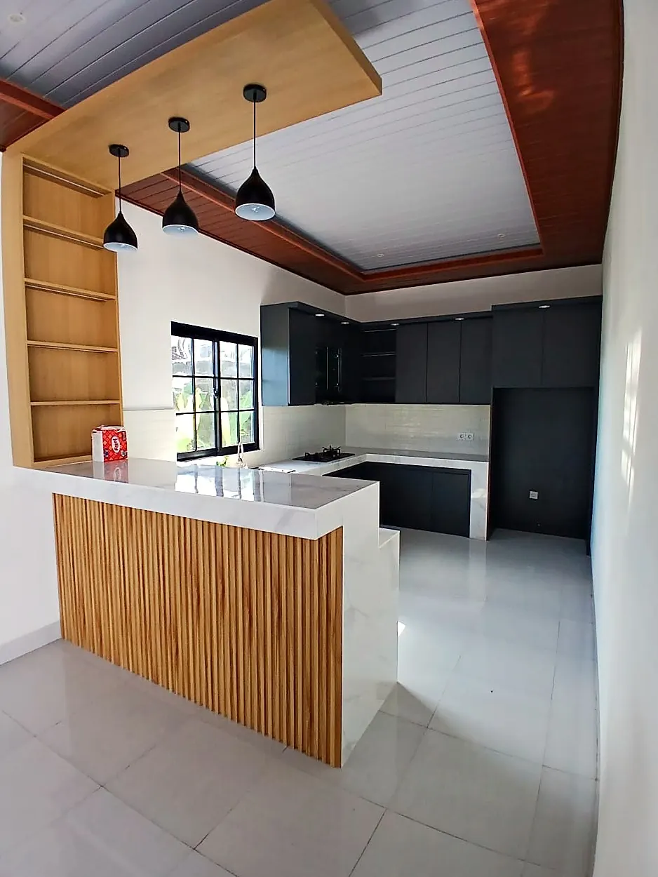 Breakfast bar with timber slats and pendant lamps