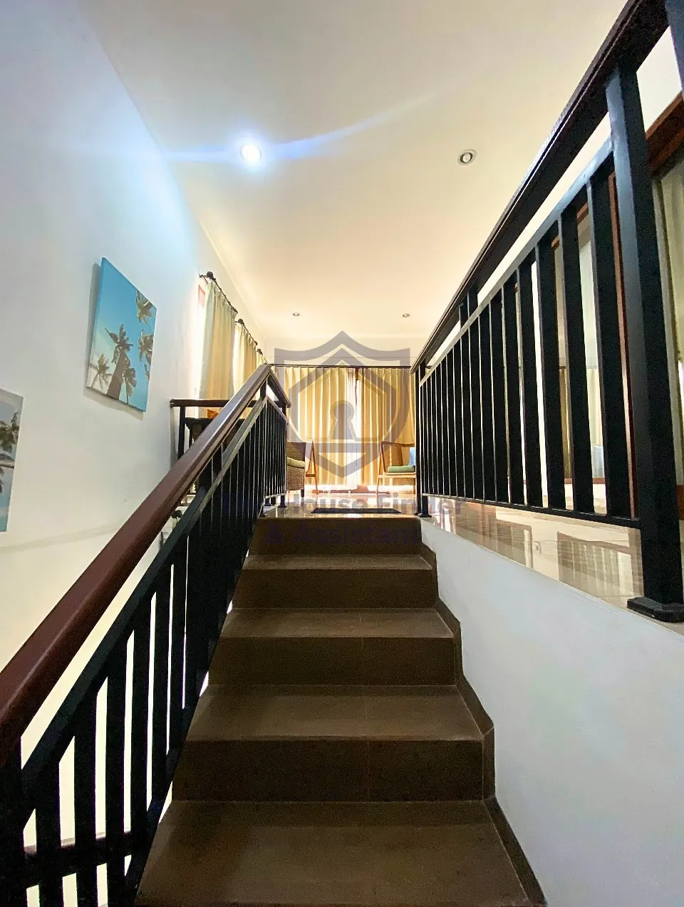 Staircase and upstairs landing with timber railings