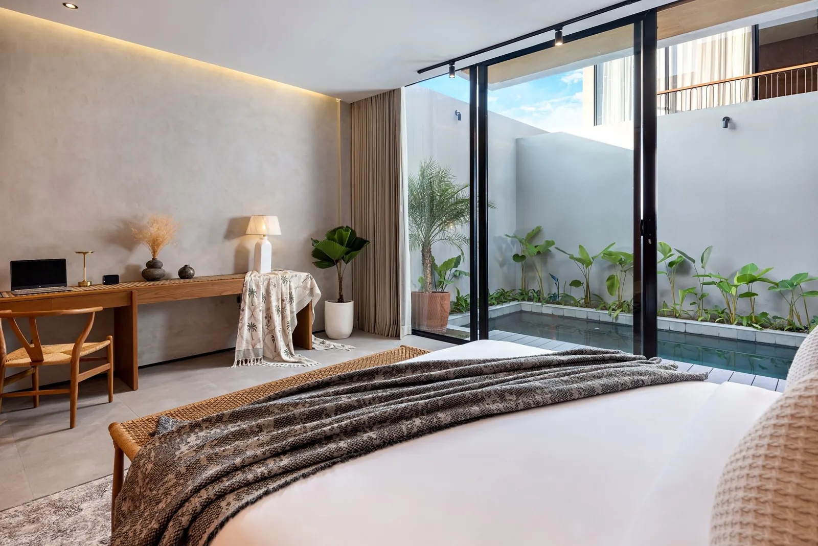 Bedroom looking out to the pool